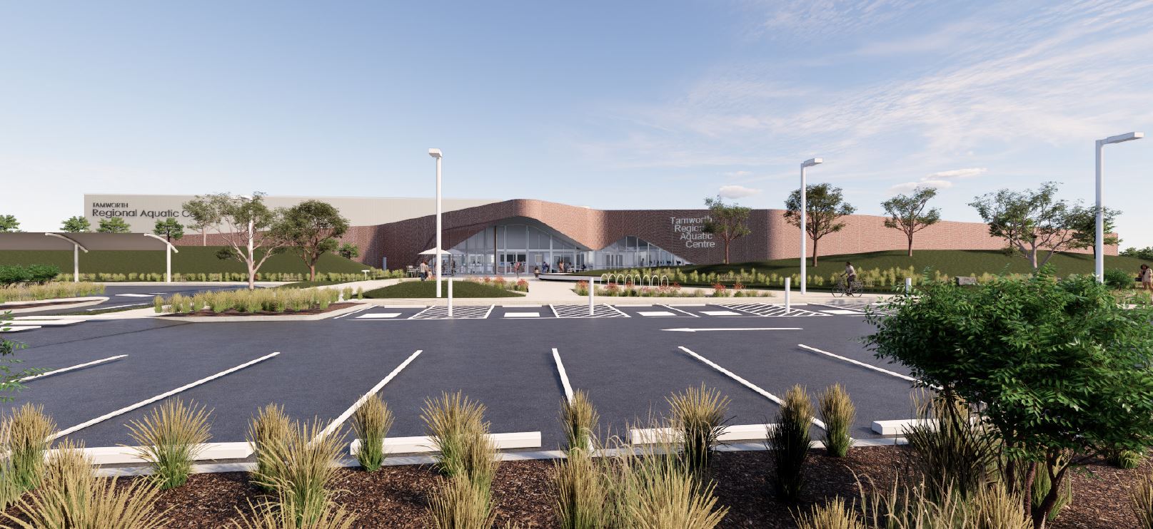 Concept design including parking lot in forefront and in background where a modern looking structure sits